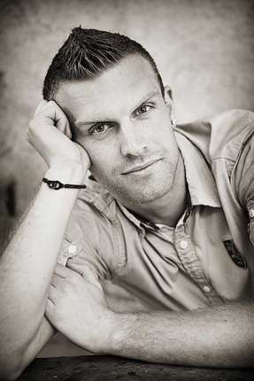 Photographe shooting photo homme